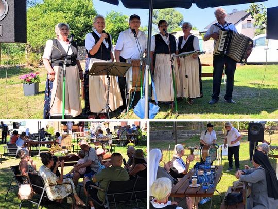Koncert muzyki ludowej w ogrodzie Kafej&Kołoczyk w Przyworach – występ Kapeli Nieznana i publiczność