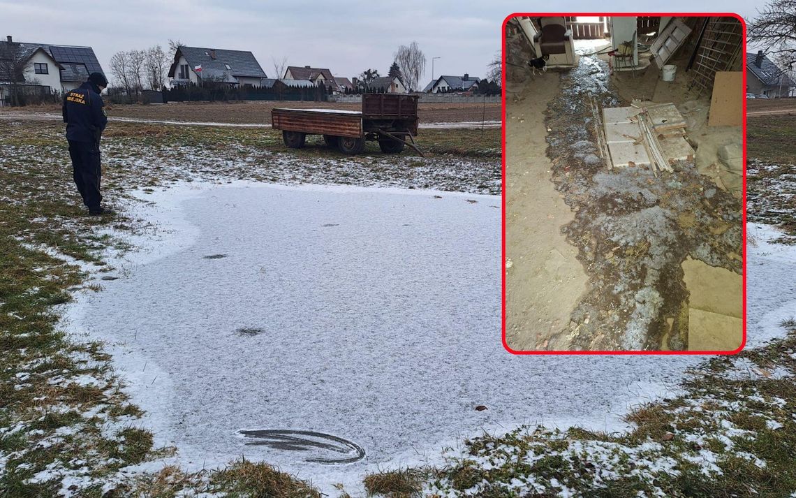 Straż Miejska w Niemodlinie zabezpiecza sprzęt po wykryciu zamarzniętych nielegalnych ścieków na ulicy w Grabinie