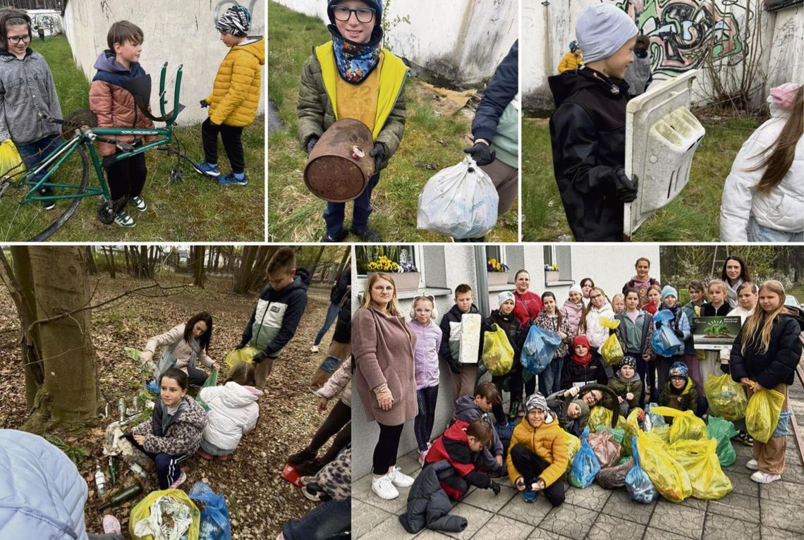 Uczniowie PSP Tarnów Opolski sprzątający teren wokół biblioteki podczas zajęć ekologicznych