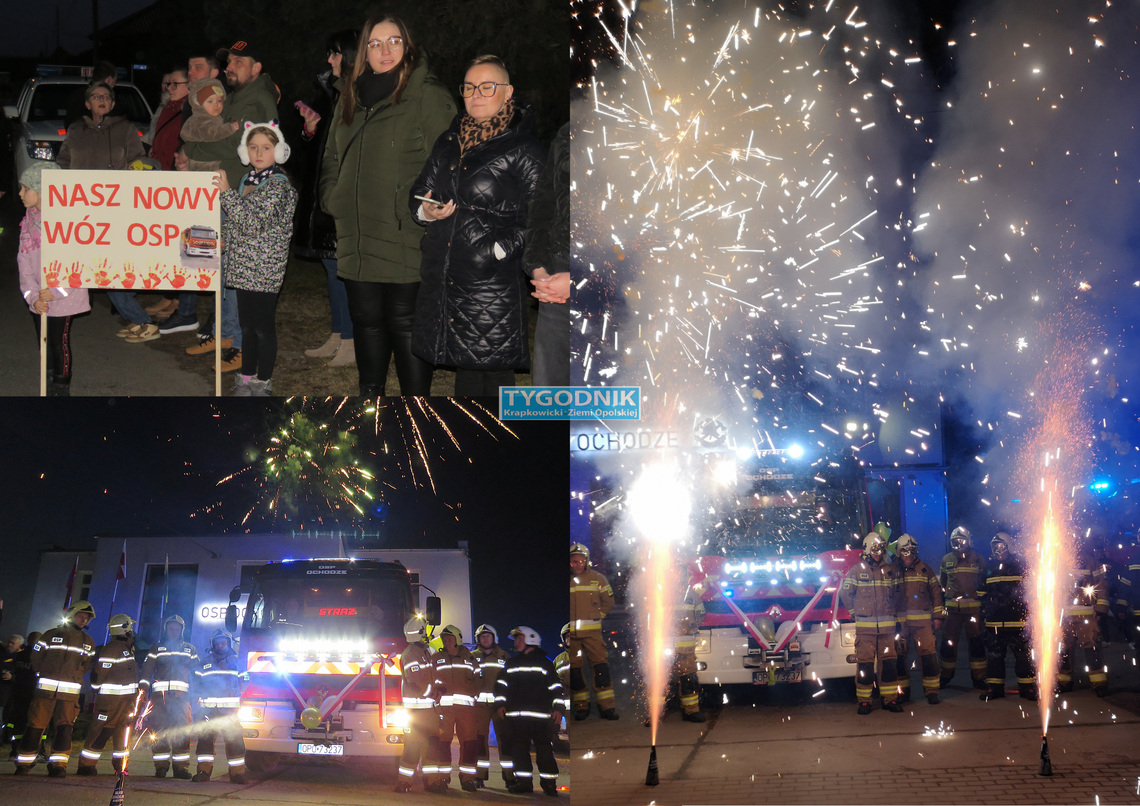 Strażacy OSP Ochodze witają nowy samochód ratowniczo-gaśniczy Renault Premium przed remizą, w tle mieszkańcy i race świetlne
